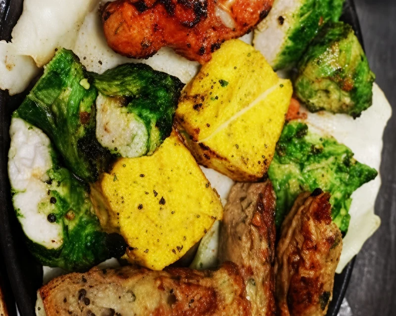 Darbar Grill tandoori kabab platter with seekh kabab, chicken tikka and paneer tikka - Darbar Restaurant Saskatoon