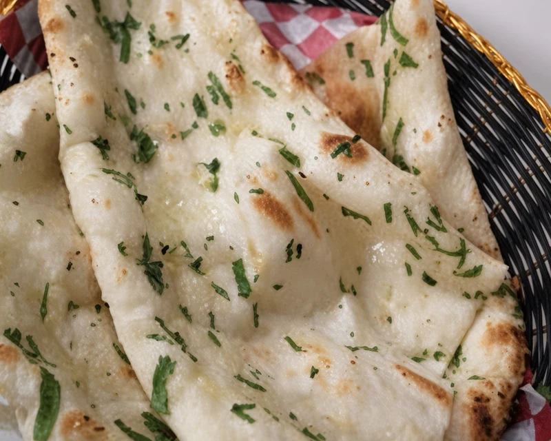 Garlic Naan flatbread from the clay oven at Darbar Restaurant, 2nd Avenue South, downtown Saskatoon