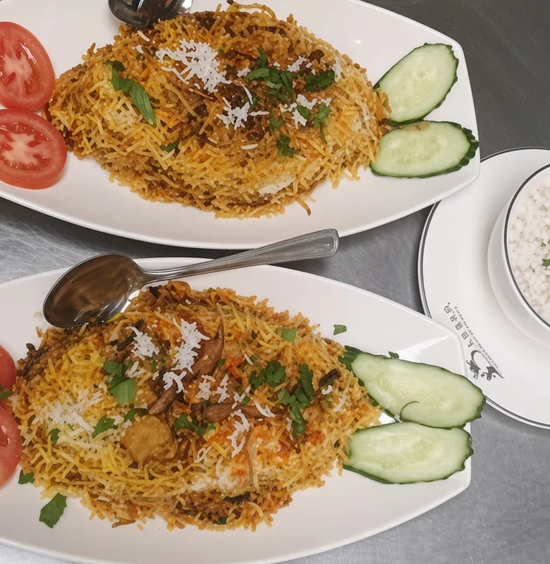 Chicken biryani, basmati rice cooked with chicken, tomatoes, ginger, garlic and spices at Darbar Restaurant, downtown Saskatoon